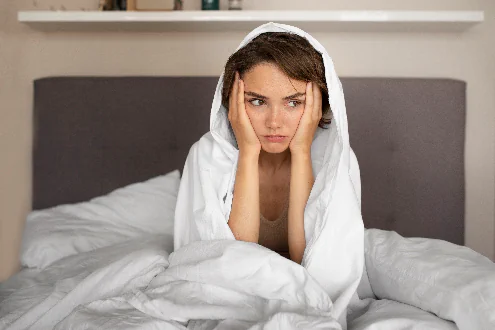 Woman showing signs of anxiety.